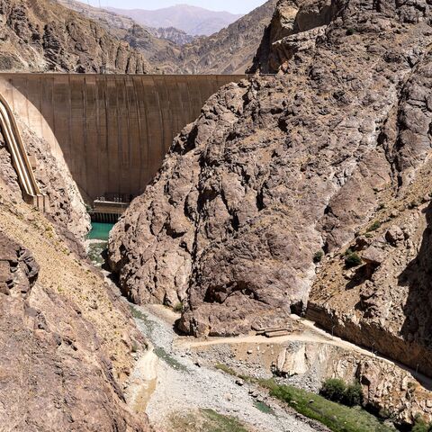 The Amir Kabir dam and its outflow along the Karaj River in Iran's northern Alborz mountain range are pictured on June 1, 2025. 