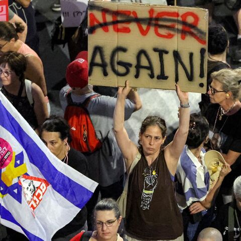 Demonstrators gather during an anti-government protest calling for action to secure the release of Israeli hostages held captive in the Gaza Strip.