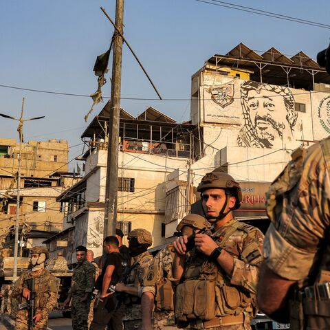 Lebanese army soldiers are stationed at the Burj al-Barajneh camp for Palestinian refugees in Beirut's southern suburbs on Aug. 21, 2025, as armed Palestinian groups in the refugee camps start handing over their weapons.