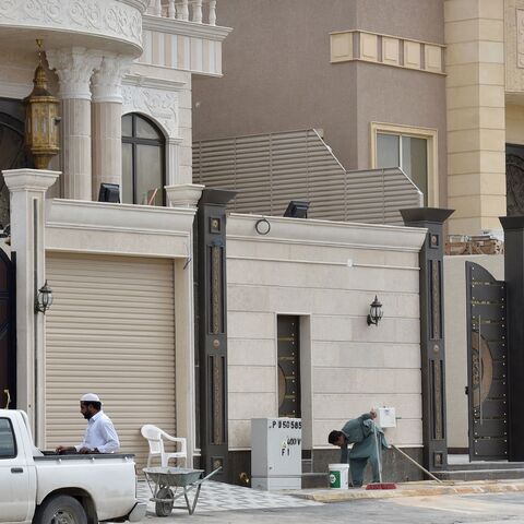 Foreign laborers work on the construction of new luxury houses in the Saudi capital, Riyadh, on April 13, 2019. 