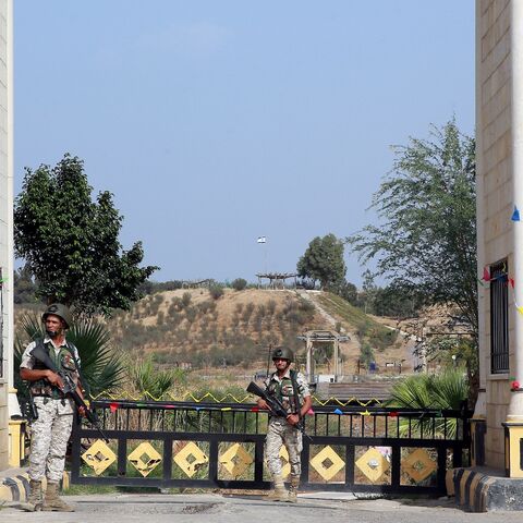 Jordanian soldiers stand guard near the "Gate of Peace" at the Jordan Valley site of Baqura, east of the Jordan River, on Nov. 13, 2019.