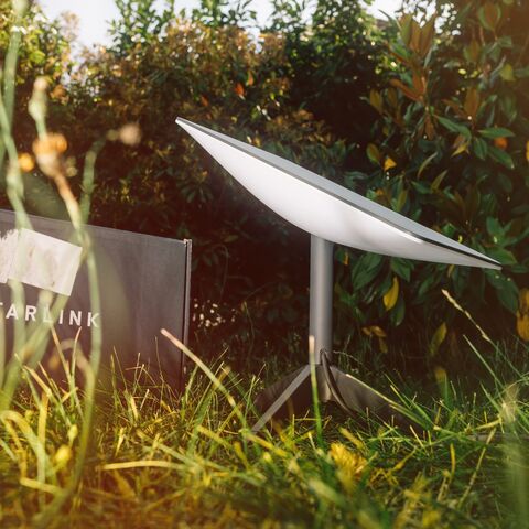 Ray of sun over the box and antenna during Unbox reliable data transmission and connection with SpaceXs Starlink.