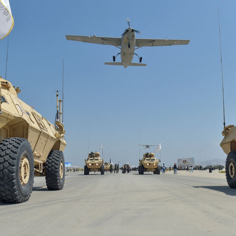 Taliban military vehicles parade to celebrate the third anniversary of Taliban's takeover of Afghanistan, at the Bagram Air Base, in Bagram, Parwan province on Aug. 14, 2024.