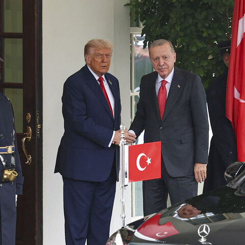 US President Donald Trump (L) greets Turkish President Recep Tayyip Erdogan (R) upon his arrival at the White House in Washington, D.C., on Sept. 25, 2025. 