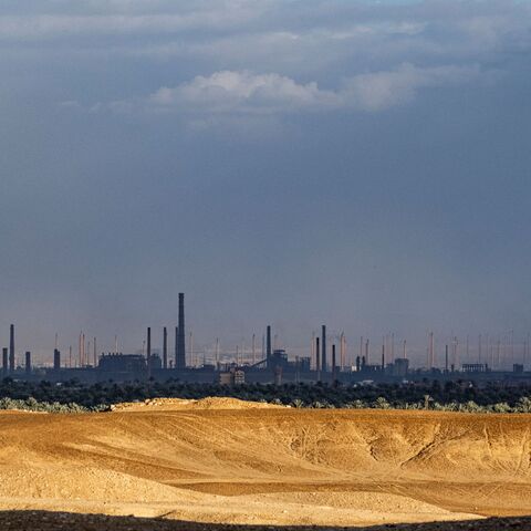 This picture taken on February 6, 2023 shows a view of Tibbin dual fuel (natural gas and fuel oil) powerplant and Helwan Steelworks, in the Helwan suburb south of Egypt's capital. (Photo by Amir MAKAR / AFP) (Photo by AMIR MAKAR/AFP via Getty Images)