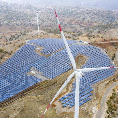 Aerial view of wind turbines and solar panel farm in Kayseri, Turkey. 