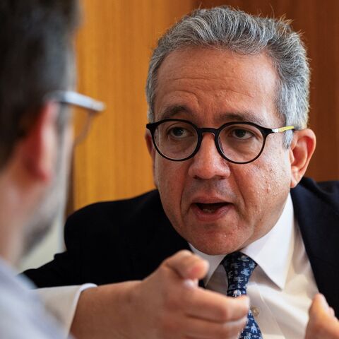 Khaled El-Enany, Egyptologist and former Minister of Tourism and Antiquities of Egypt, speaks during an interview with AFP at a hotel in Paris on April 10, 2025. 