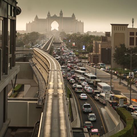  A picture taken from a station of Dubai's Palm Monorail, shows traffic on a road in Palm Jumeirah on August 28, 2025.