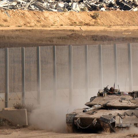 An Israeli tank moves along Israel's border with the Gaza Strip, on Sept. 25, 2025, amid the ongoing war between Israel and the Palestinian Hamas militant group. 