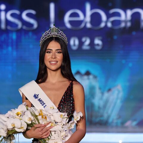 Newly elected Miss Lebanon Perla Harb poses on stage after winning the Miss Lebanon 2025 pageant, in Zouk Mosbeh, north of Beirut, on Oct. 4, 2025.
