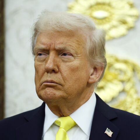 US President Donald Trump looks on during a press conference in the Oval Office of the White House, on Oct. 15, 2025, in Washington
