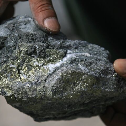 Spots of gold-rich ore speckle a stone pictured during a press tour at the Al-Amar Gold Mine, in the Riyadh region on May 28, 2008.