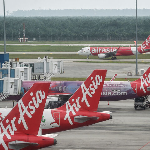 AirAsia airplanes are pictured on the tarmac at Kuala Lumpur International Airport in Sepang on Jan. 8, 2024. 