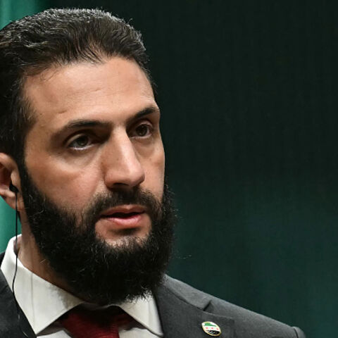 Syria's interim president Ahmed al-Sharaa holds a joint press conference with the Turkish president following their meeting at the Presidential Palace in Ankara, on February 4, 2025. Syria's interim president is in Turkey for talks with the country's leader after flying in from Saudi Arabia, where he was seeking help from wealthy Gulf countries to finance the reconstruction of his war-ravaged nation and revive its economy, as part of his second international trip since ousting the former Syrian president. (