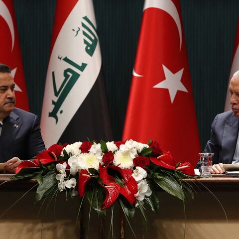 Turkish President Recep Tayyip Erdogan (R) and Iraq's prime minister, Mohammed Shia al-Sudani, during the signing ceremony of memorandums of understanding between Iraq and Turkey, in Ankara on May 8, 2025. 