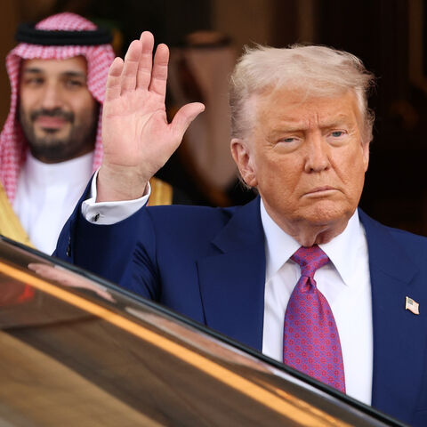 US President Donald J. Trump leaves the Saudi Royal Court with Saudi Crown Prince Mohammed bin Salman on May 13, 2025, in Riyadh, Saudi Arabia. 
