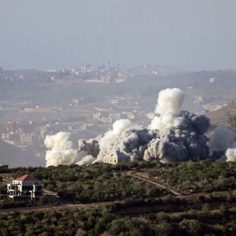 Smoke rises from the site of an Israeli airstrike that targeted the southern Lebanese village of El Mahmoudiyeh on November 27, 2025. The Israeli military said it had carried out a series of strikes against Hezbollah in southern Lebanon on November 27, the latest despite the year-old ceasefire with the militant group. (Photo by Rabih DAHER / AFP via Getty Images)