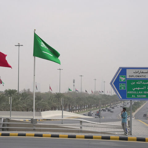 Flags of China and Saudi Arabia are seen in this picture, in Riyadh, Saudi Arabia, December 7, 2022. REUTERS/Mohammed Benmansour