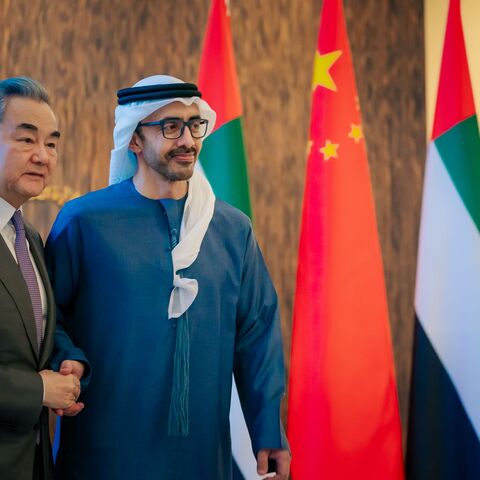 Chinese Foreign Minister Wang Yi (L) and Emirati Foreign Minister Sheikh Abdullah bin Zayed Al Nahyan (R) during a meeting on Dec. 12 in Abu Dhabi.