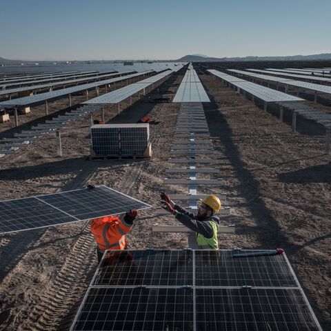 Employees install new solar panels at the Kalyon Energy's Karapinar Solar Power Plant on December 02, 2021 in Karapinar, Turkey. 