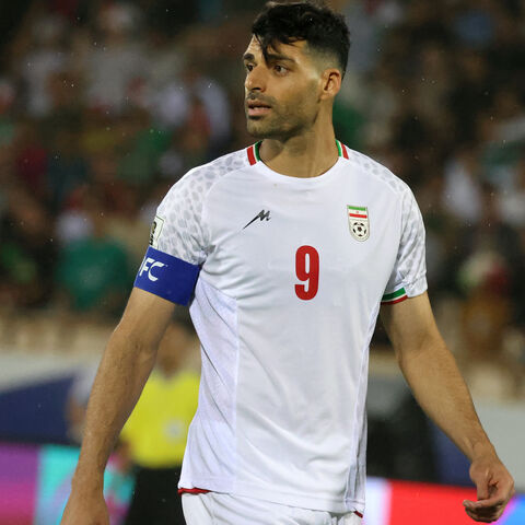 Iran’s forward #9 Mehdi Taremi looks on during the FIFA World Cup 2026 Asia zone qualifiers Group A football match between Iran and the North Korea at the Azadi Sports Complex in Tehran on June 10, 2025.