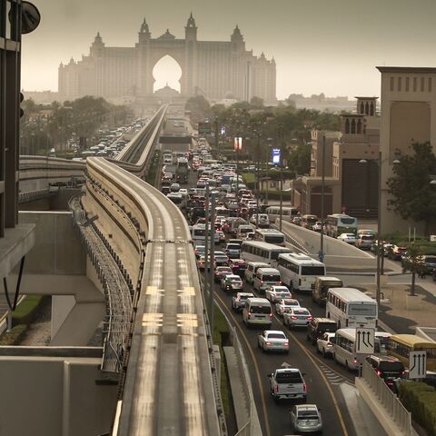 A picture taken from a station of Dubai's Palm Monorail shows traffic on a road in Palm Jumeirah on Aug. 28, 2025. 