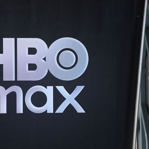 The HBO Max logo is seen outside the Warner Bros. Discovery offices in Culver City, California, on December 5, 2025. Streaming giant Netflix said December 5, 2025 it will buy film and television studio Warner Bros. Discovery for nearly $83 billion, the entertainment industry's biggest consolidation deal this decade. The acquisition gives Netflix access to a vast film catalog as well as the prestigious streaming service HBO Max. (Photo by Patrick T. Fallon / AFP via Getty Images)