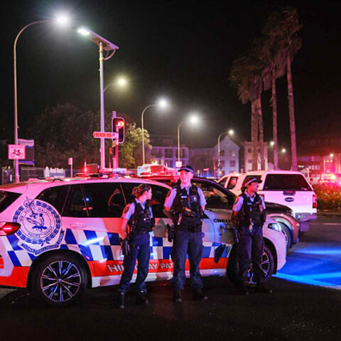 DECEMBER 14: Police enforce a cordon at Bondi Beach after a mass shooting on December 14, 2025 in Sydney, Australia. Two gunmen dressed in black fired several shots at Sydney's world-famous Bondi Beach, causing at least 10 fatalities and several more casualties, as New South Wales police said the toll was very likely to climb. (Photo by George Chan/Getty Images)