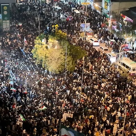 This aerial view shows residents waving Somaliland flags as they gather to celebrate Israel's announcement recognizing Somaliland's statehood in downtown Hargeisa, on Dec. 26, 2025. 