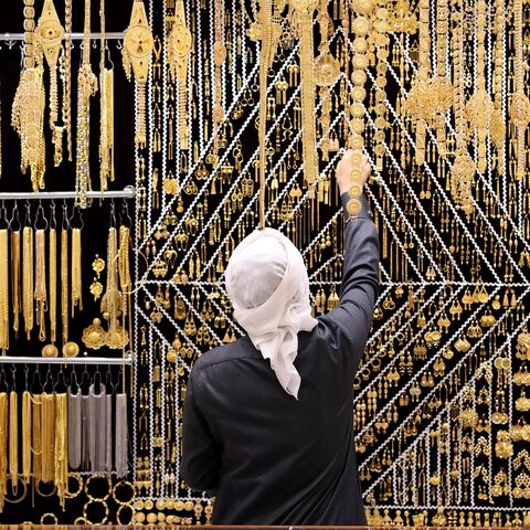 A salesman arranges gold jewelry at Dubai Gold Souk, on Nov. 25, 2020, in Dubai, United Arab Emirates.