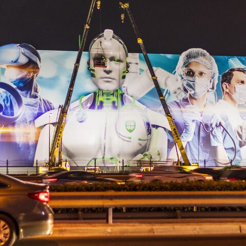 Advertisement boards on main road of the city Sheikh Zayed Road.