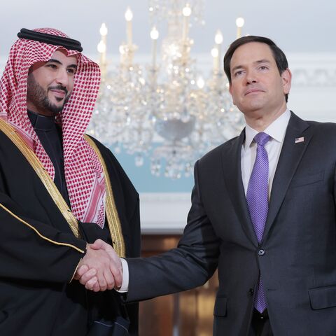 Saudi Arabian Defense Minister Prince Khalid bin Salman and US Secretary of State Marco Rubio pose for a photo opportunity ahead of a meeting in the US State Department Building on Feb. 25, 2025, in Washington, DC.