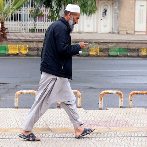 A Baluch Iranian man walks in Zahedan, in the southeastern province of Sistan-Baluchistan, on Dec. 18, 2025. 