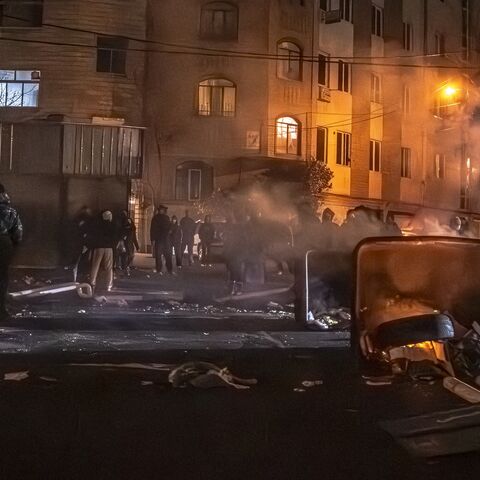 Iranians gather while blocking a street during a protest in Tehran, Iran, on Jan. 9, 2026. 