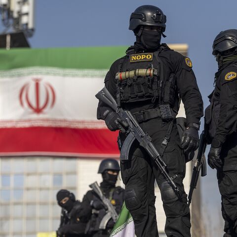 Security forces are seen during a pro-government rally on January 12, 2026, in Tehran, Iran. 