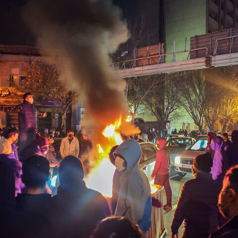 Fires are lit as protesters rally on Jan. 8, 2026 in Tehran, Iran. 