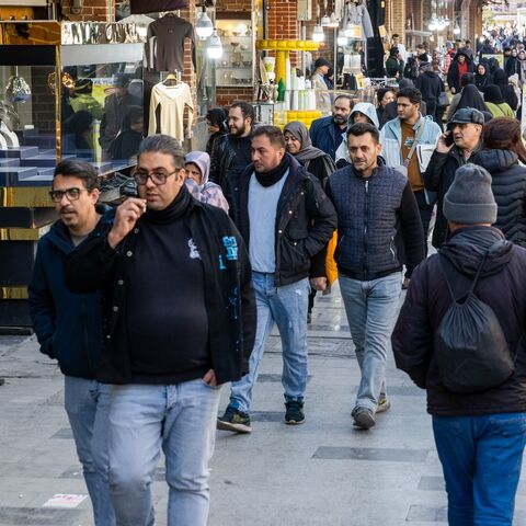 Pedestrians make their way along a path at Tehran Grand Bazaar, on Jan. 18, 2026 in Tehran, Iran. 