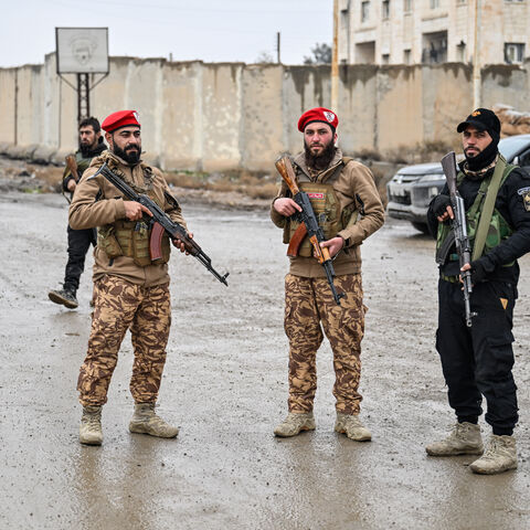 Members of Syrian government takeover the Al-Aqtan prison after Kurdish-led Syrian Democratic Forces (SDF) forces withdraw from al-Aqtan prison, bound for Kobani, on the outskirts of the northeastern Syrian city of Raqqa on Jan. 23, 2026. 
