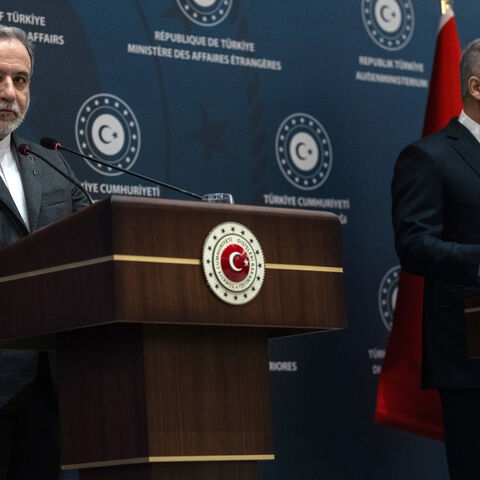 Turkey's Foreign Minister Hakan Fidan (R) and his Iranian counterpart Abbas Araghchi (L) give a statement at the Ritz Hotel as they meet on Jan. 30, 2026 in Istanbul, Turkey. 