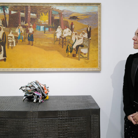 Safeya Binzagr's painting of a coffee shop on Madina Road (top) and John Chamberlain sculpture Spledidium (below) on view as part of Sotheby's Origins II in Diriyah, Riyadh. (Courtesy of Sotheby’s)