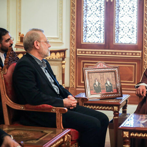 Secretary of the National Security Council, Ali Larijani meets with the Minister of the Royal Office in the Sultanate of Oman, Sultan bin Mohammed al Numani, in Muscat, Oman, February 10, 2026. Iran's National Security Council/WANA (West Asia News Agency)/Handout via REUTERS ATTENTION EDITORS - THIS PICTURE WAS PROVIDED BY A THIRD PARTY.