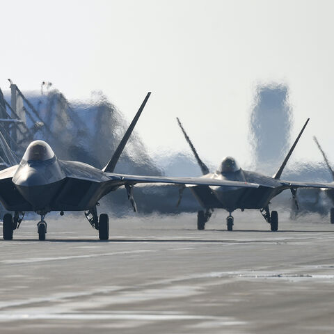 In this handout image released by the South Korean Defense Ministry, US F-22 fighter jets move after landing at the Kunsan airbase during the joint air drills on Dec. 20, 2022 in Kunsan, South Korea. 