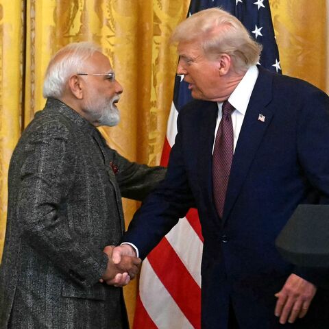 US President Donald Trump shakes hands with Indian Prime Minister Narendra Modi during a joint press conference in the East Room of the White House in Washington, on Feb. 13, 2025.