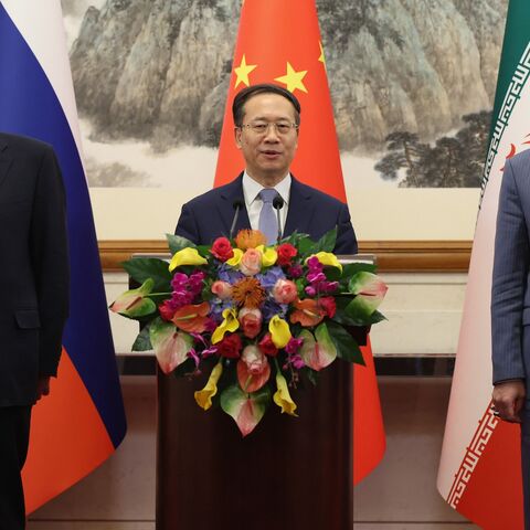(L-R) Russian Deputy Foreign Minister Sergei Ryabkov, Chinese Executive Vice Minister of Foreign Affairs Ma Zhaoxu, and Iranian Deputy Foreign Minister Kazem Gharibabadi hold a press conference after their meeting in Beijing on March 14, 2025.