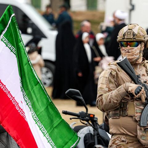 A member of the security forces stands guard during a rally marking the 47th anniversary of the 1979 Islamic Revolution in Tehran on Feb. 11, 2026. 