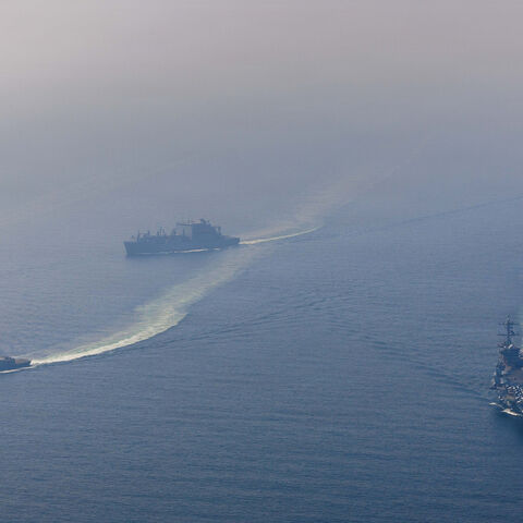 (EDITOR'S NOTE: This Handout image was provided by a third-party organization and may not adhere to Getty Images' editorial policy.) In this handout photo obtained from the U.S. Defence Department, Nimitz-class aircraft carrier USS Abraham Lincoln (CVN 72) sails alongside Arleigh Burke-class guided-missile destroyer USS Frank E. Petersen Jr. (DDG 121) and Lewis and Clark-class dry cargo ship USNS Carl Brashear (T-AKE 7) in the Arabian Sea, Feb. 6, 2026. According to the U.S. government, the Abraham Lincoln 