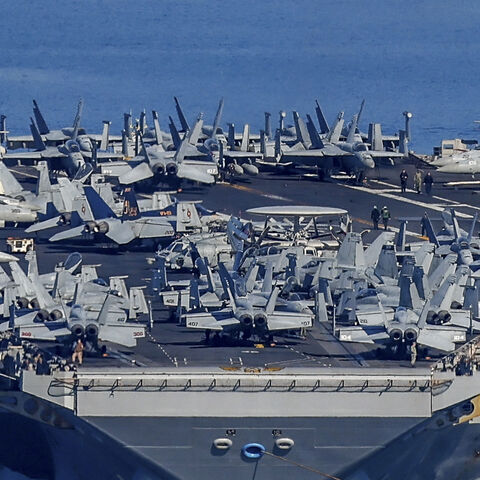 The US Navy aircraft carrier USS Gerald R. Ford departs Souda Bay on the island of Crete on February 26, 2026. (Photo by Costas METAXAKIS / AFP via Getty Images)