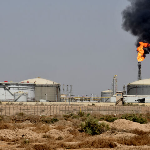 A picture shows smoke billowing from the Central Production Facility 1 gas refinery in Iraq's southern Maysan province on May 29, 2022.