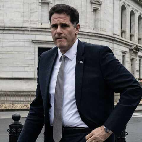 Israeli Prime Minister Benjamin Netanyahu (L) is joined by Israeli Minister of Strategic Affairs Ron Dermer and other officials for a meeting with US Secretary of Defense Pete Hegseth (not pictured) at the Pentagon, July 9, 2025. 