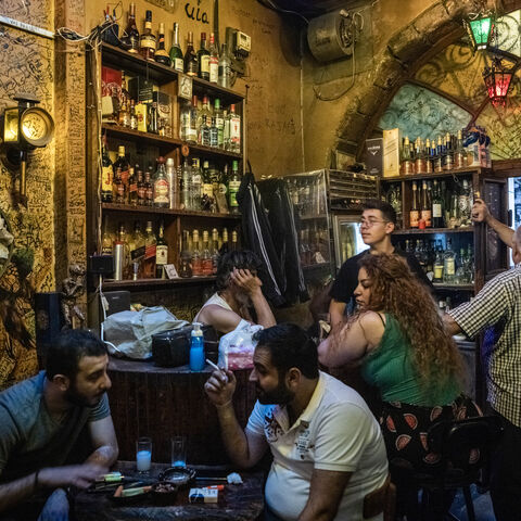 People drink and chat in a bar in the old town in Damascus on June 19, 2025 in Damascus, Syria. 